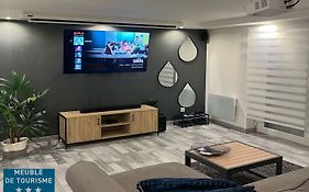 Très bel appartement type loft de 40 m2 dans maison avec parking privatif